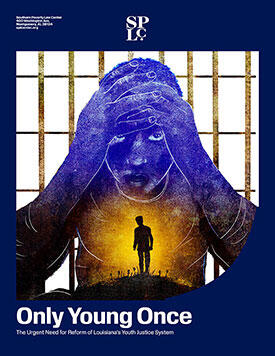 African American youth with their hands on their head, standing before bars