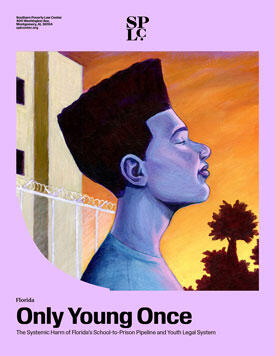 Profile of a Black youth in front of barbed wire fence