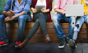 high school students on the phone, computer and tablet