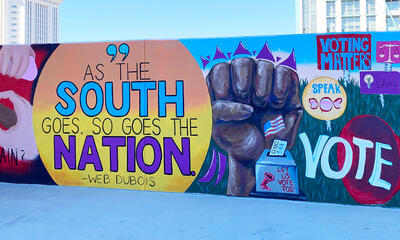 A section of the wall mural featured outside of an SPLC office.