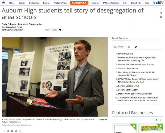 Auburn High School student Jake Evans speaks on Wednesday during a presentation of a class project at the Auburn Public Library.